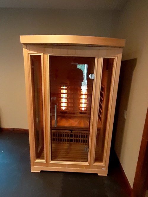 medical saunas with happy customer 80